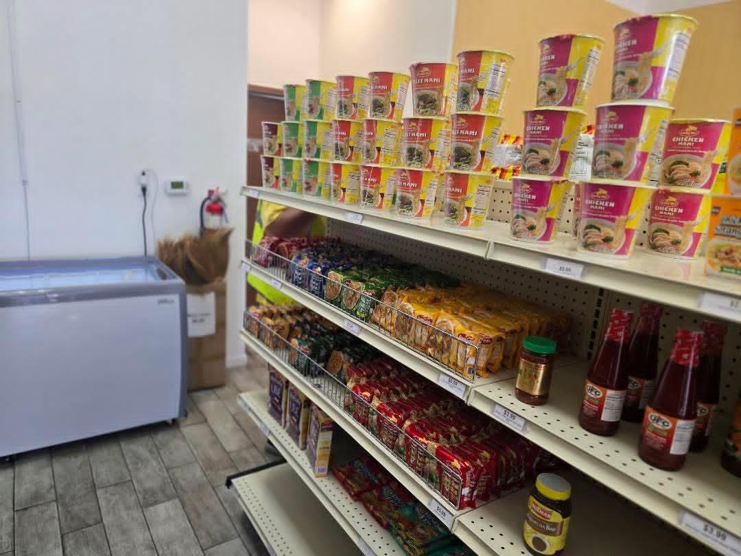 Lucky Me instant noodles and pancit shelves inside Pips Filipino market